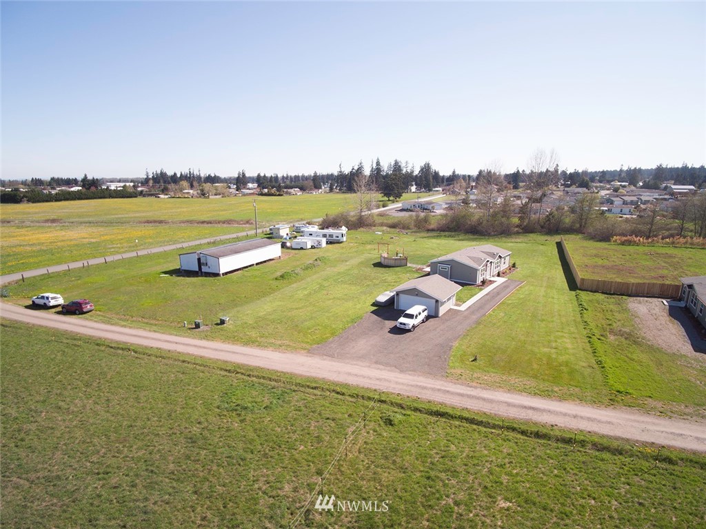 55 Old Goat Lane Sequim, WA 98382 - Photo 23 of 32 a view of a lake with a city