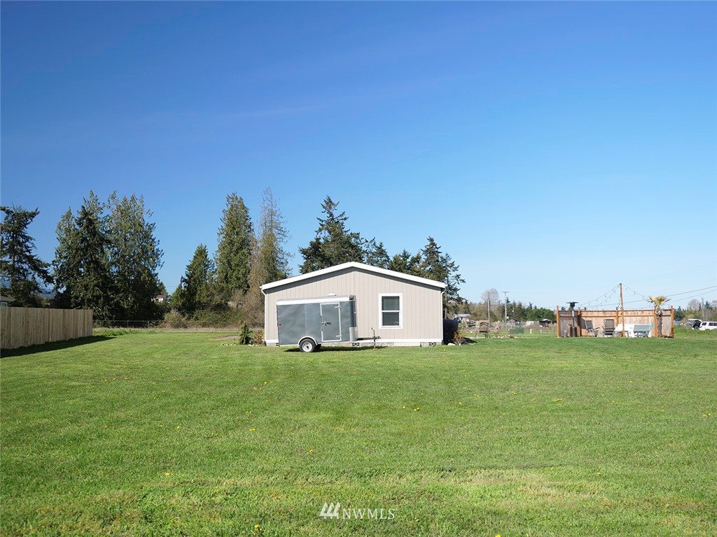 55 Old Goat Lane Sequim, WA 98382 - Photo 27 of 32 a house with garden in front of it