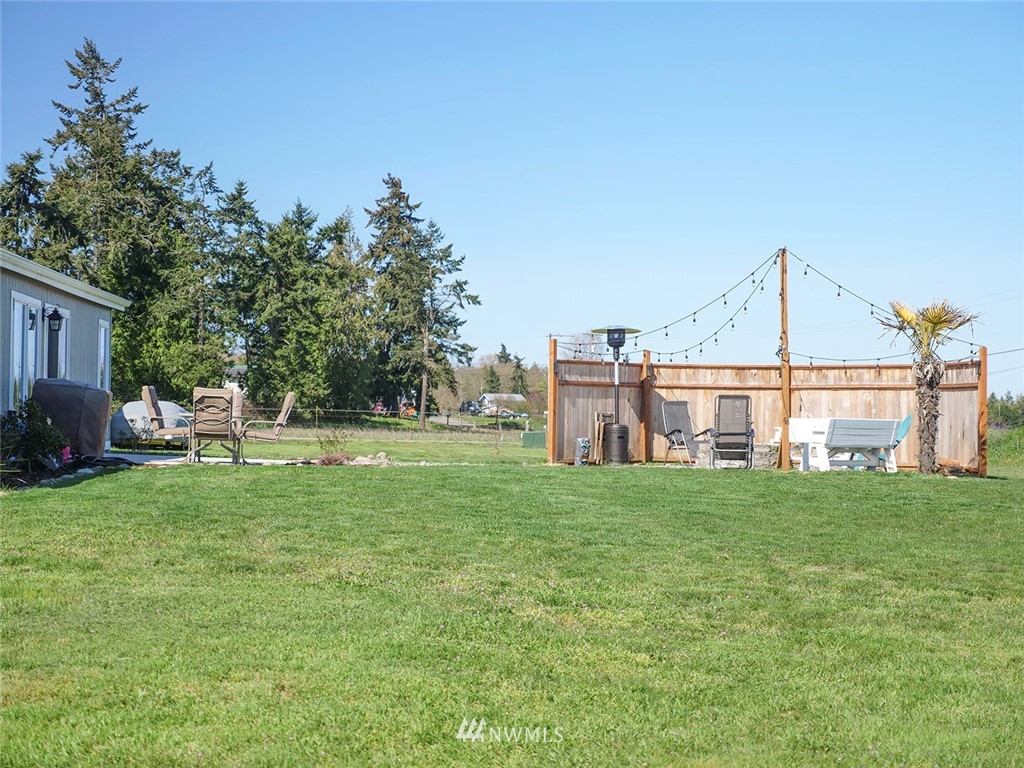 55 Old Goat Lane Sequim, WA 98382 - Photo 29 of 32 a front view of a house with a yard
