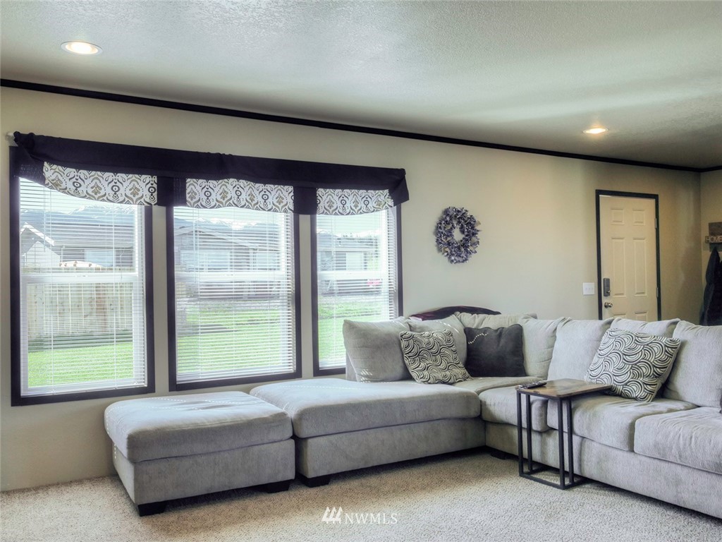 55 Old Goat Lane Sequim, WA 98382 - Photo 4 of 32 a living room with furniture and a large window
