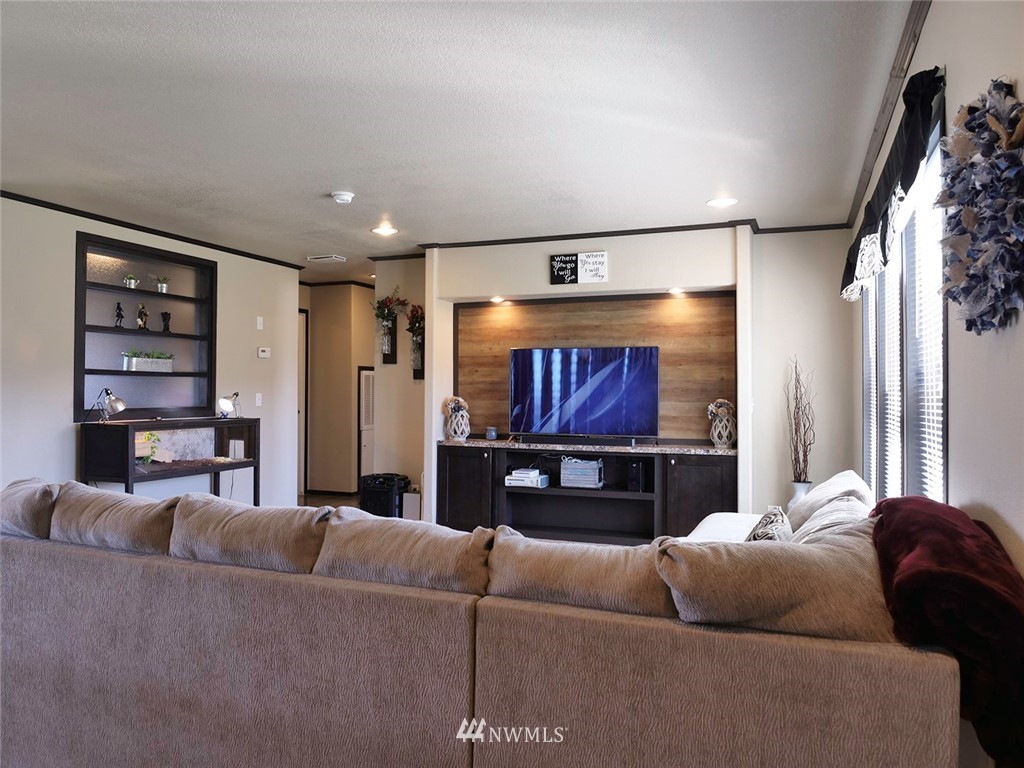 55 Old Goat Lane Sequim, WA 98382 - Photo 5 of 32 a living room with furniture and a flat screen tv