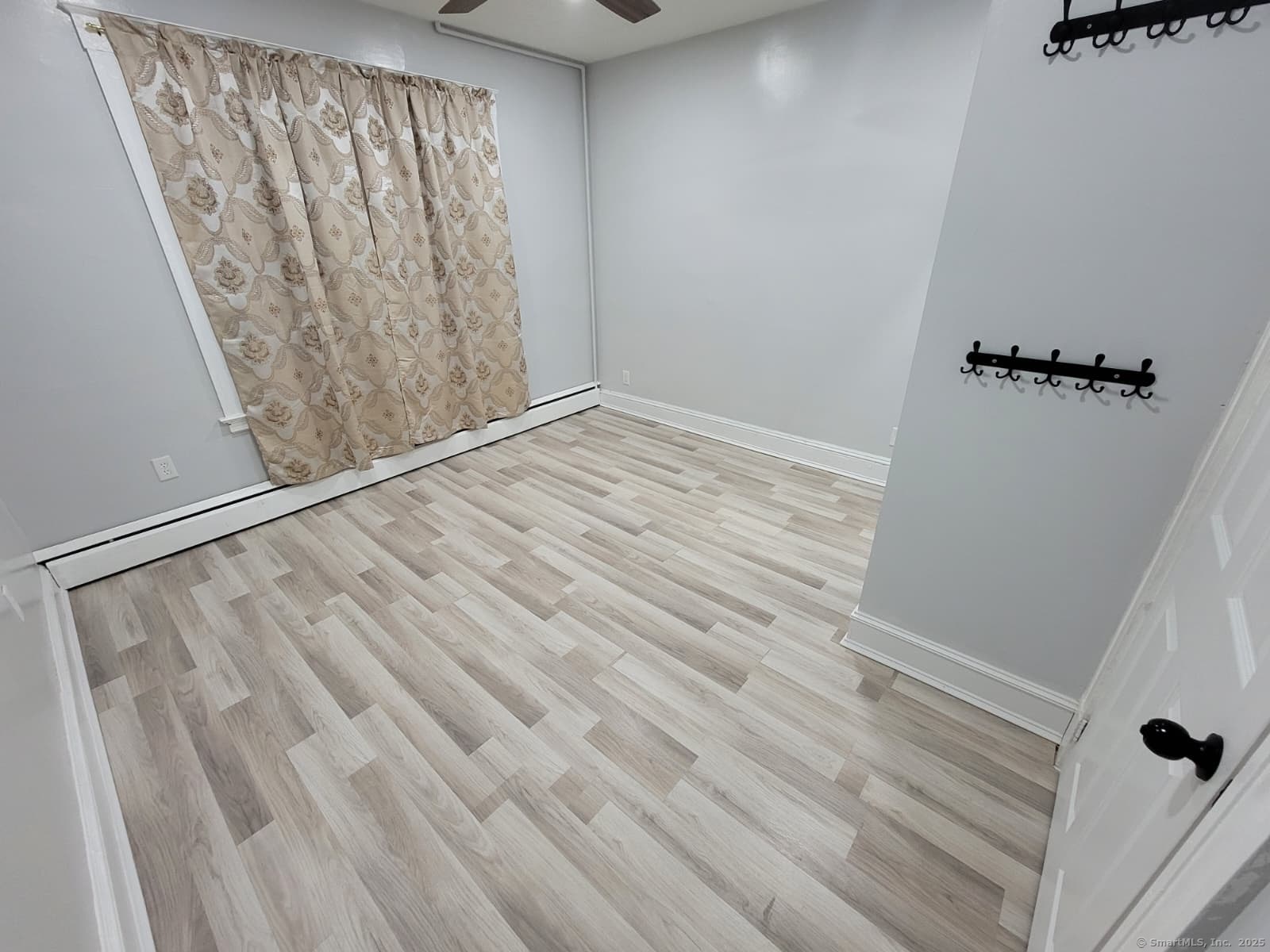 120 Brown Street, Unit 1 Hartford, CT 06114 - Photo 6 of 6 a view of entryway with wooden floor