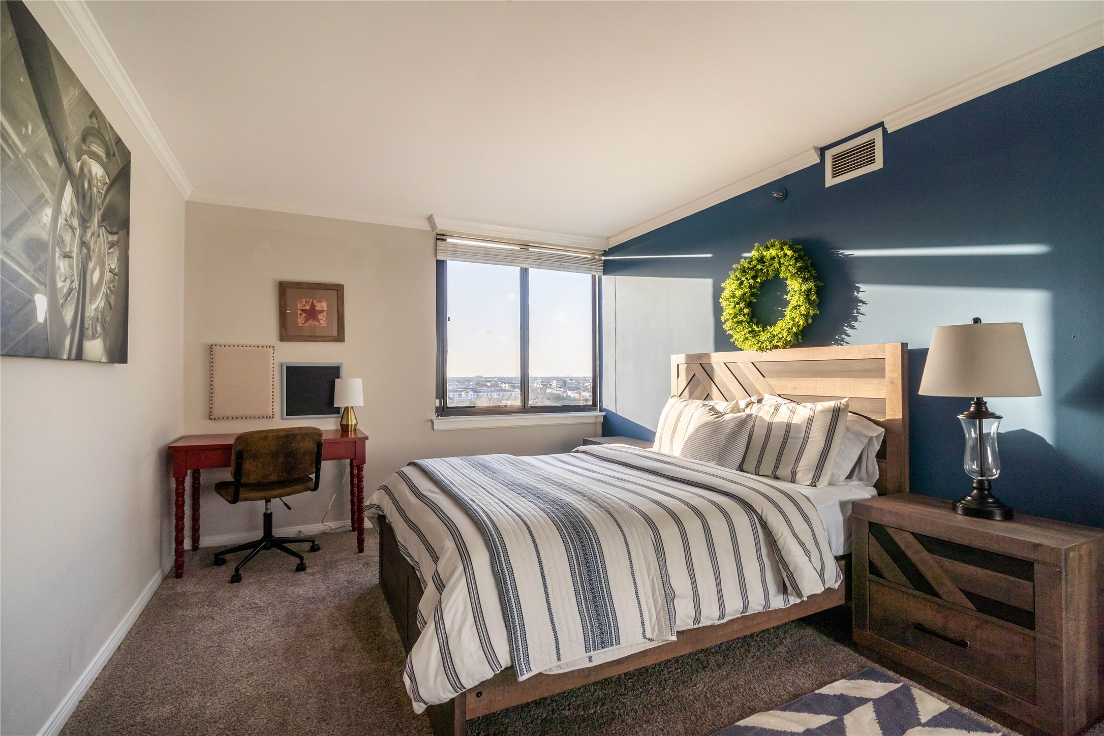 3525 Sage Road, Unit 1315 Houston, TX 77056 - Photo 13 of 23 a bedroom with a bed and a window