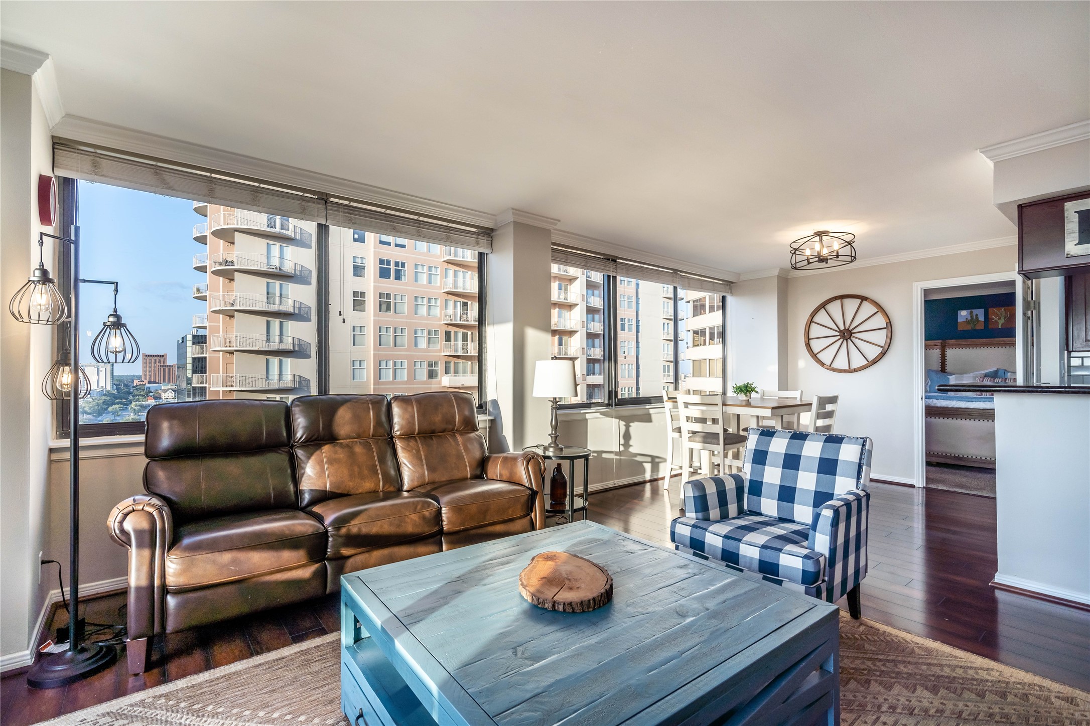 3525 Sage Road, Unit 1315 Houston, TX 77056 - Photo 3 of 23 a living room with furniture a clock and a large window