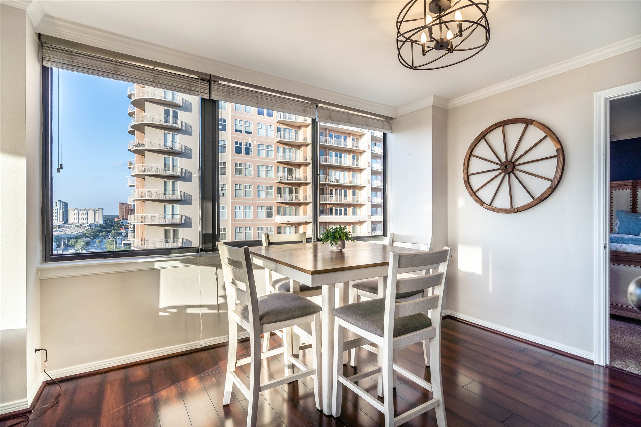 3525 Sage Road, Unit 1315 Houston, TX 77056 - Photo 5 of 23 a view of a dining room with furniture window and wooden floor
