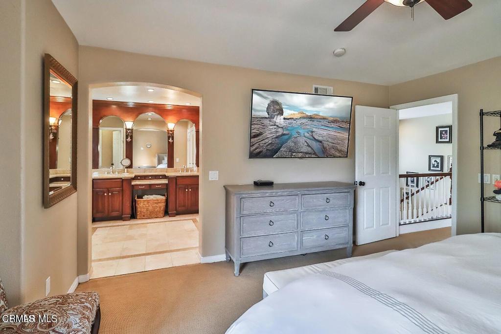 963 Corte Augusta Camarillo, CA 93010 - Photo 20 of 27 a bedroom with a bed and a large window