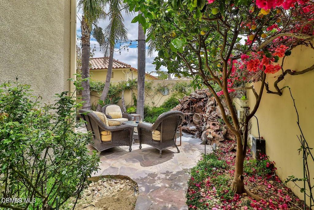963 Corte Augusta Camarillo, CA 93010 - Photo 24 of 27 a view of a patio with couches table and chairs and potted plants
