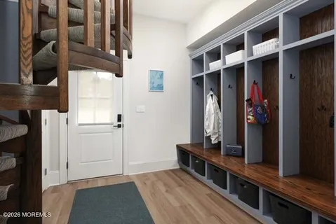 a large bedroom with a bed and a fireplace