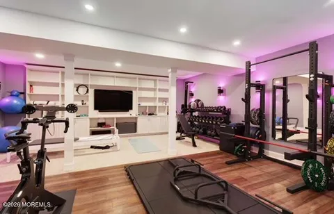 a kitchen with stainless steel appliances granite countertop a stove and a refrigerator