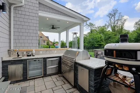 a kitchen with stainless steel appliances a stove and a refrigerator