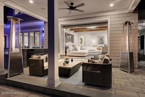 a view of a backyard with plants and lake view