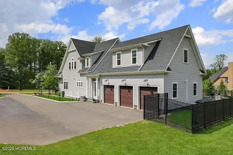 an aerial view of a house with a garden
