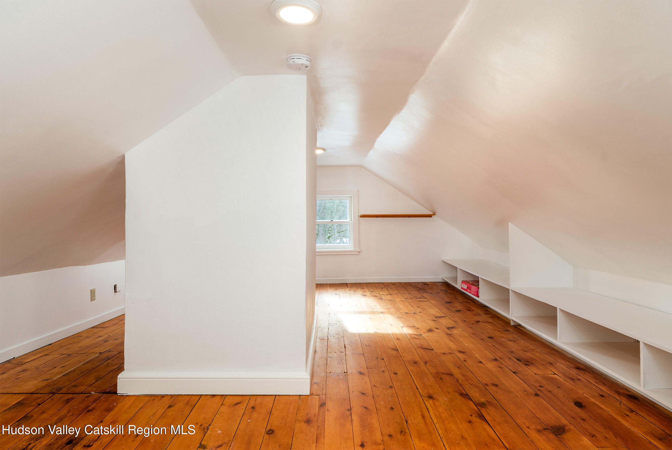 6 Westridge Road Cooperstown, NY 13326 - Photo 101 of 119 a view of an empty room with wooden floor