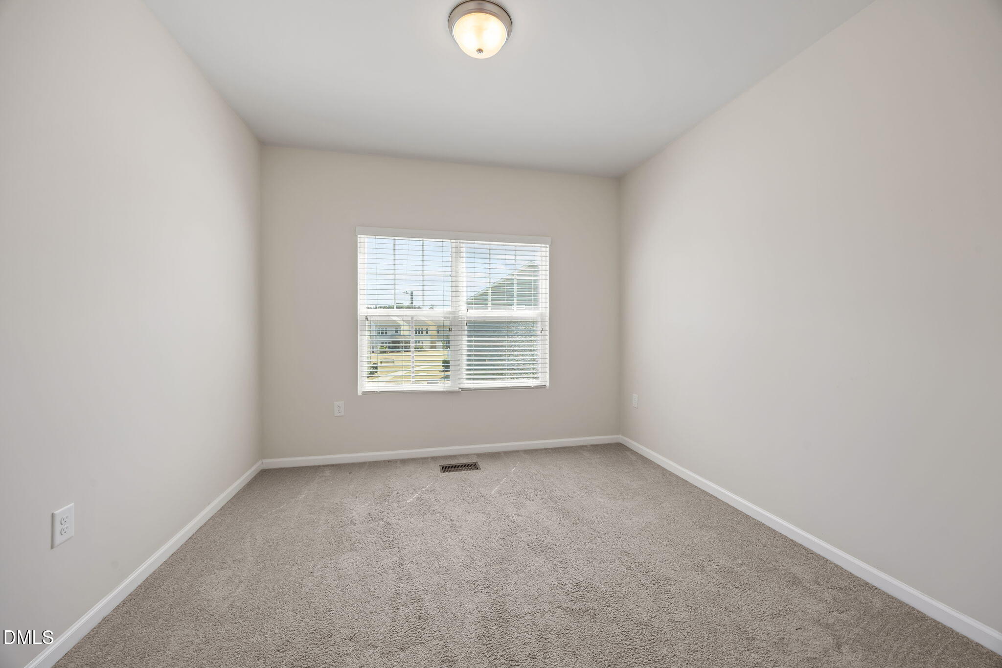 1005 Epiphany Road Morrisville, NC 27560 - Photo 17 of 23 an empty room with a window