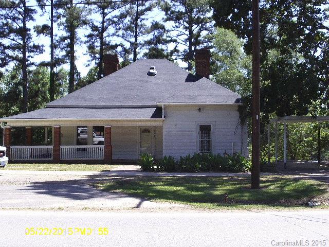 2061 Smithford Road Hickory Grove, SC 29717 - Photo 1 of 5 a front view of a house with a yard garage and outdoor seating