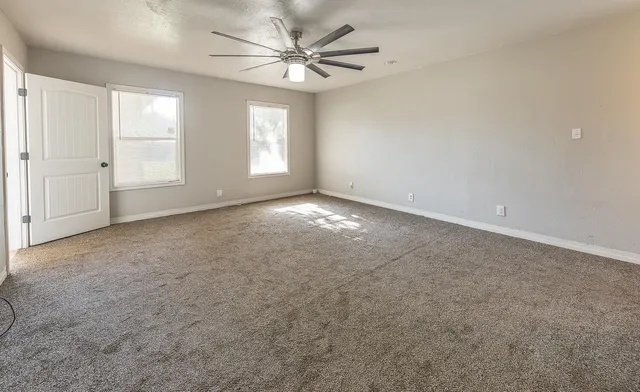 a bathroom with a bathtub and toilet