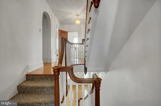 a bathroom with a shower and a sink
