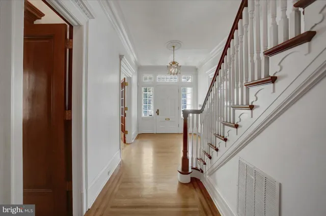 a very nice looking room with a large window and couch