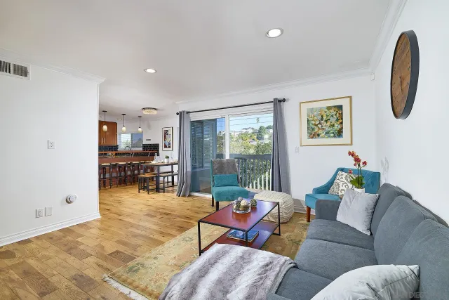a living room with furniture and a table