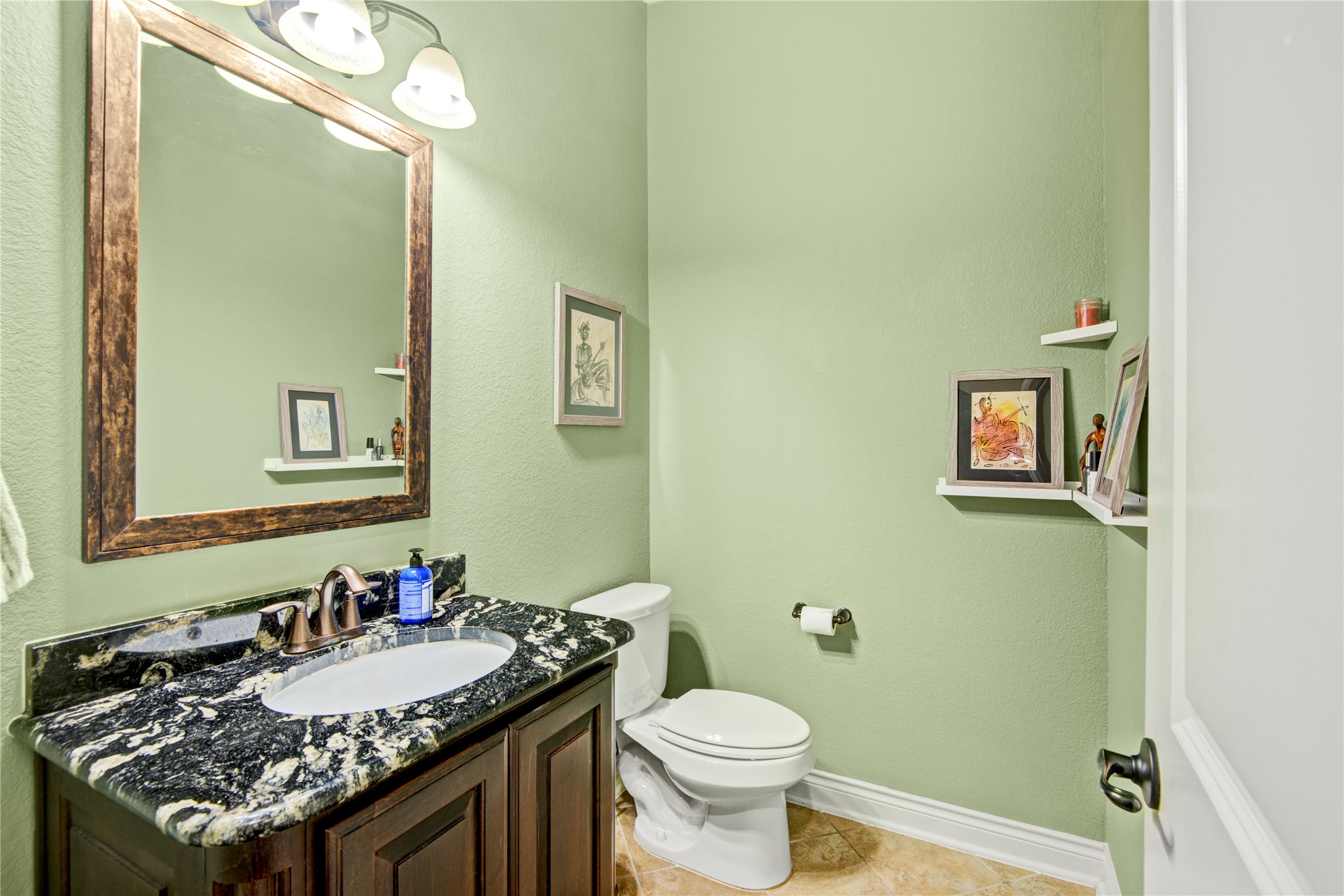 4315 Sanctuary Halls Spring, TX 77388 - Photo 44 of 50 a bathroom with a granite countertop sink and a mirror