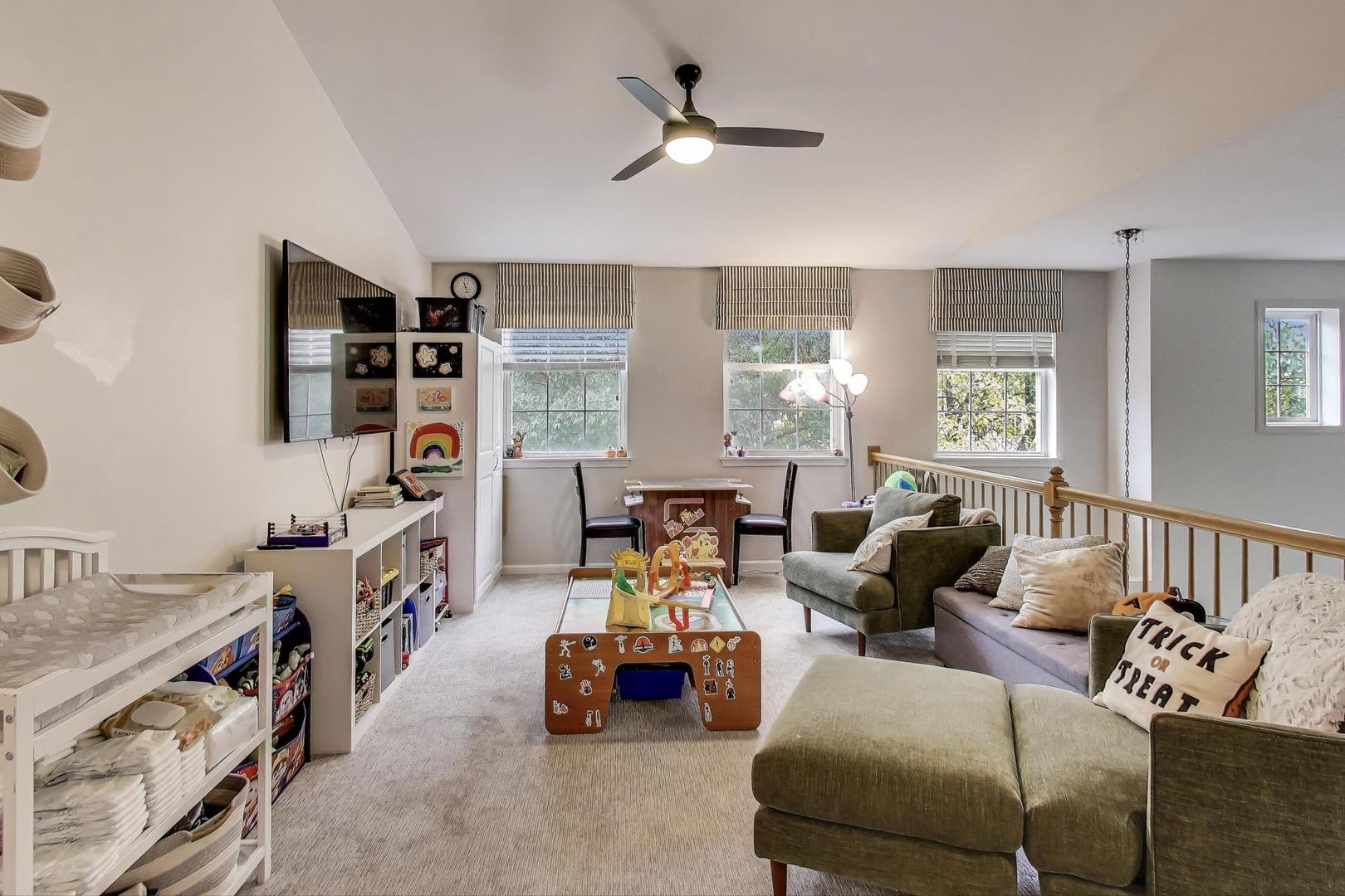 1010 Evergreen Street Mundelein, IL 60060 - Photo 14 of 28 a living room with furniture and a window