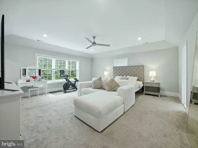 a living room with furniture and white walls