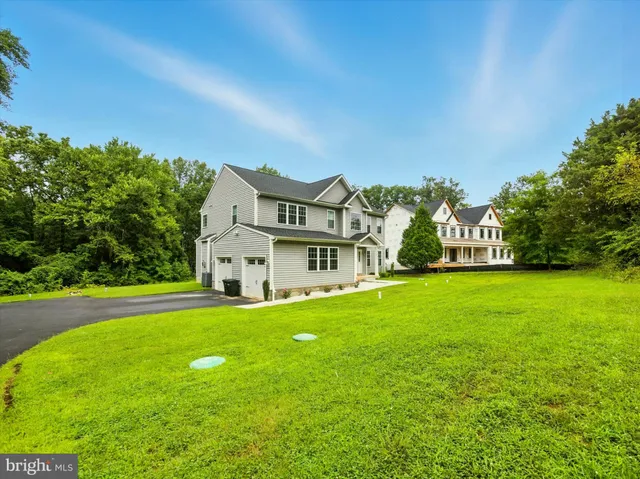a view of a house with a big yard