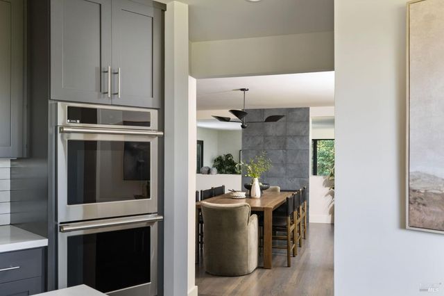 a view of a kitchen from the hallway