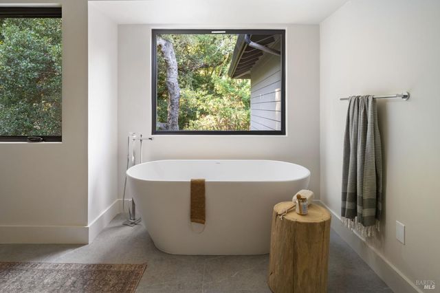 a view of a bathtub in a room
