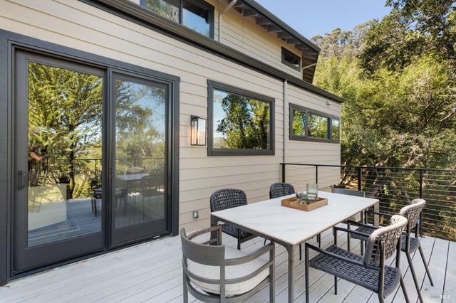 a view of a outdoor seating area with furniture