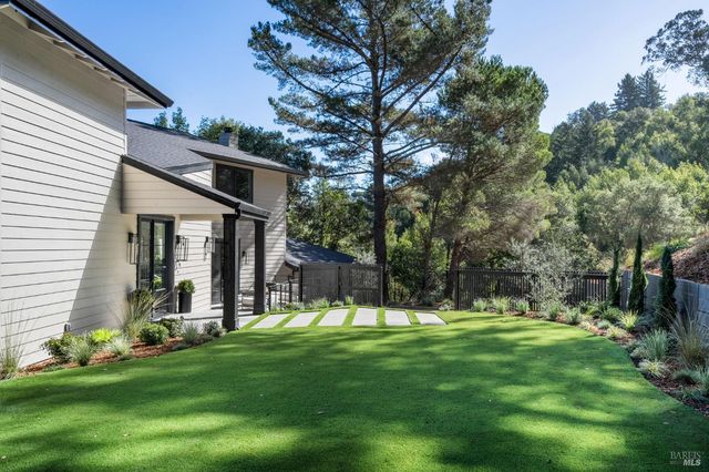 a view of a back yard of the house