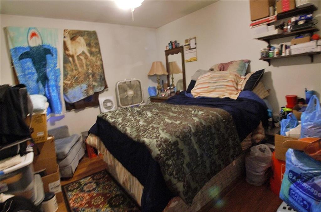 247 Moorehead Road Sarver, PA 16055 - Photo 11 of 41 a bed sitting in a bedroom next to a window