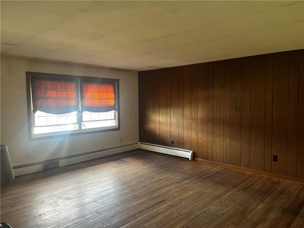247 Moorehead Road Sarver, PA 16055 - Photo 4 of 41 an empty room with wooden floor and windows