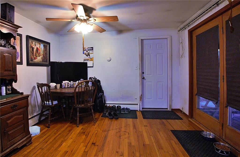 247 Moorehead Road Sarver, PA 16055 - Photo 8 of 41 a view of a livingroom with furniture and a ceiling fan