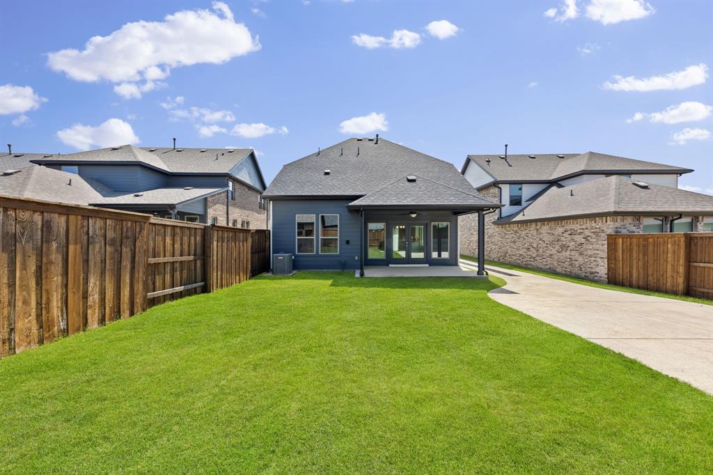 1844 Rosedale Avenue Van Alstyne, TX 75495 - Photo 18 of 26 Our 3207 plan offers a great back yard space perfect for family bbq's!