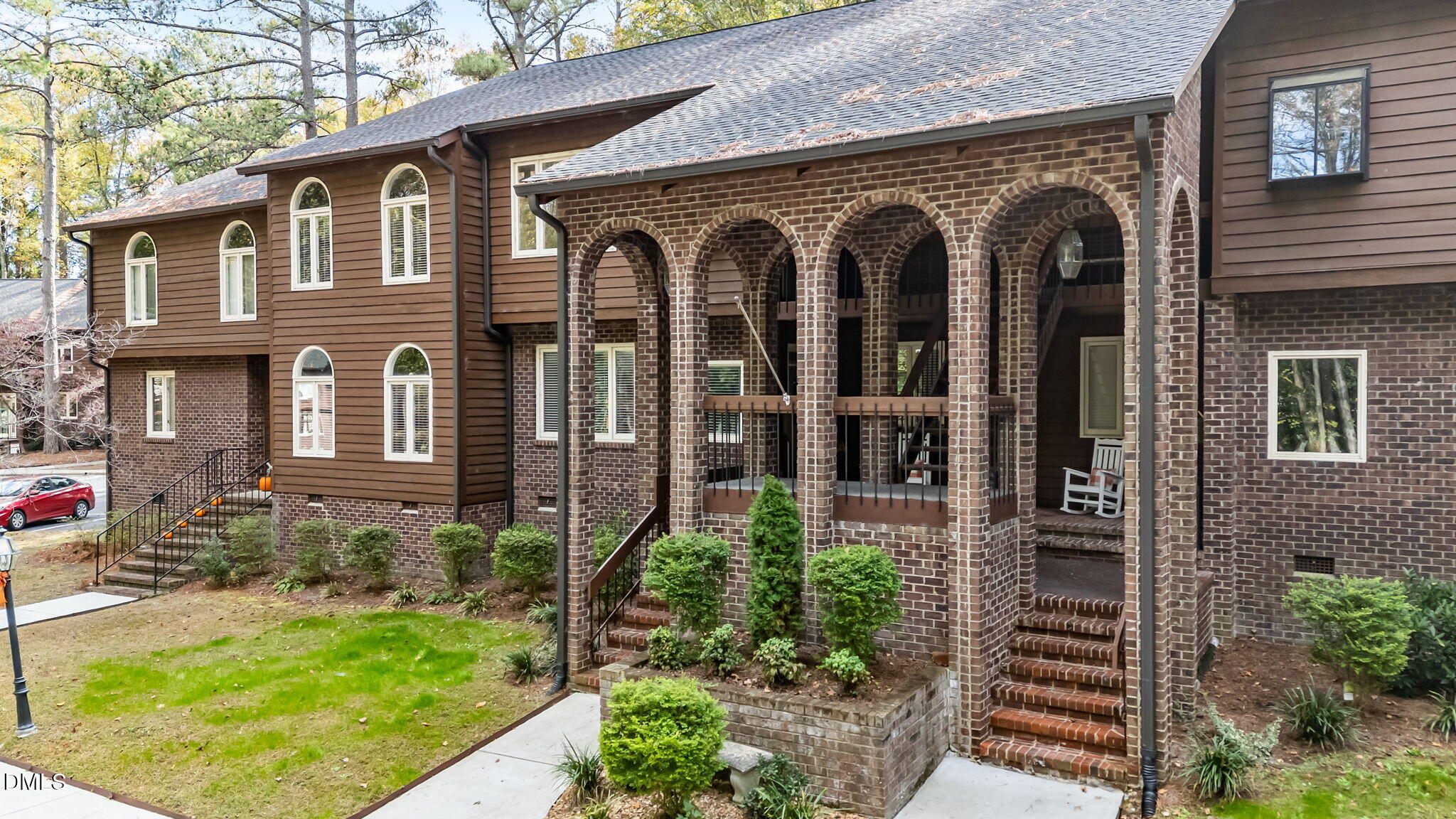 front view of a house with a garden
