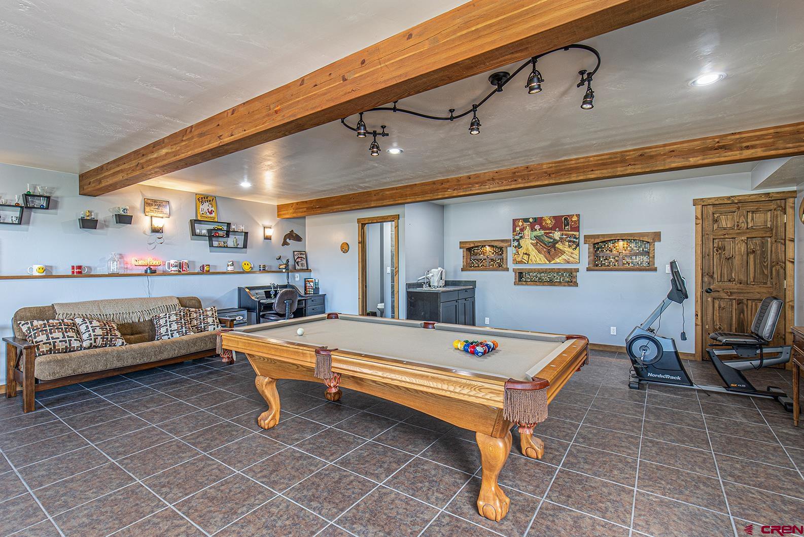 616 North Rainbow Road Durango, CO 81303 - Photo 29 of 35 Bonus space on bottom level with own entrance. Currently used as a game room.