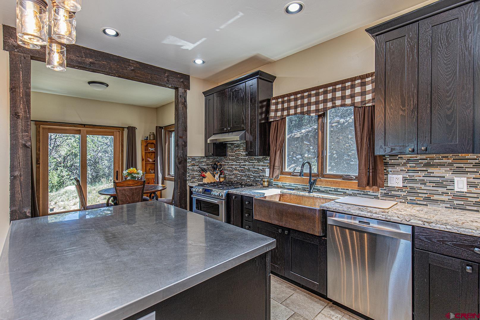 616 North Rainbow Road Durango, CO 81303 - Photo 8 of 35 View of dining room off of kitchen.