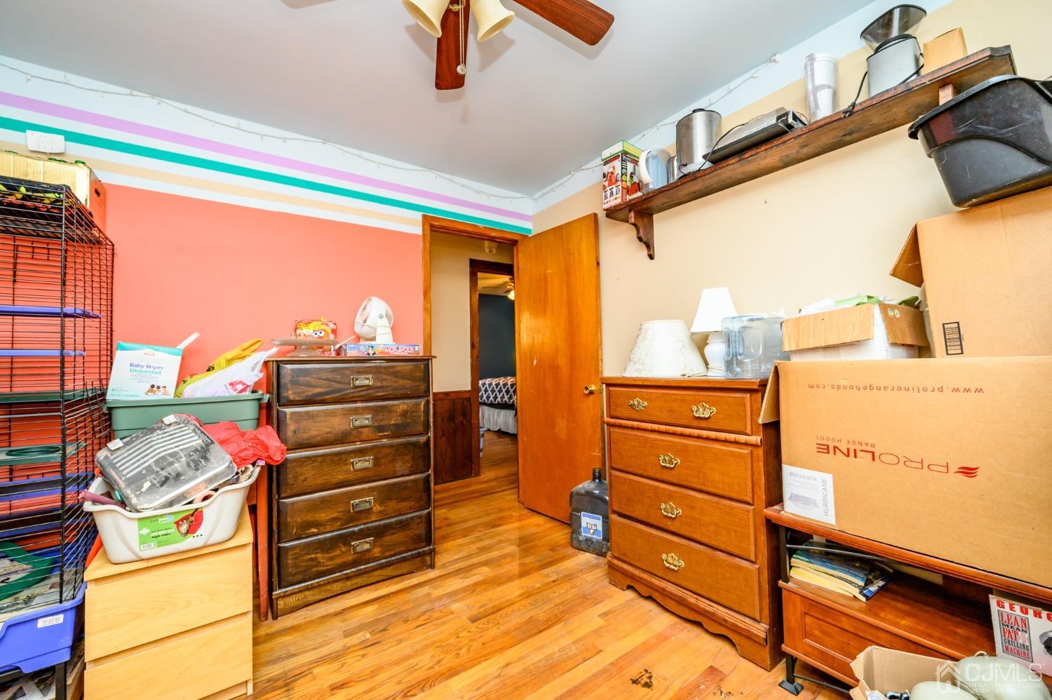 7 Lozaw Road Franklin, NJ 07416 - Photo 18 of 27 a view of walk in closet with clothes and shoes