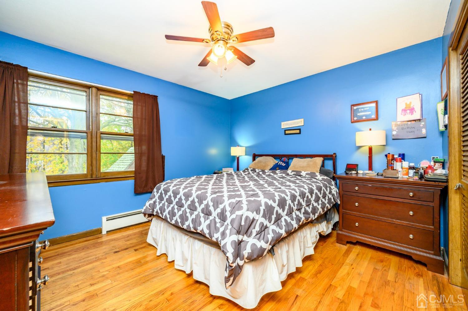 7 Lozaw Road Franklin, NJ 07416 - Photo 21 of 27 a bed sitting in a bedroom next to a window