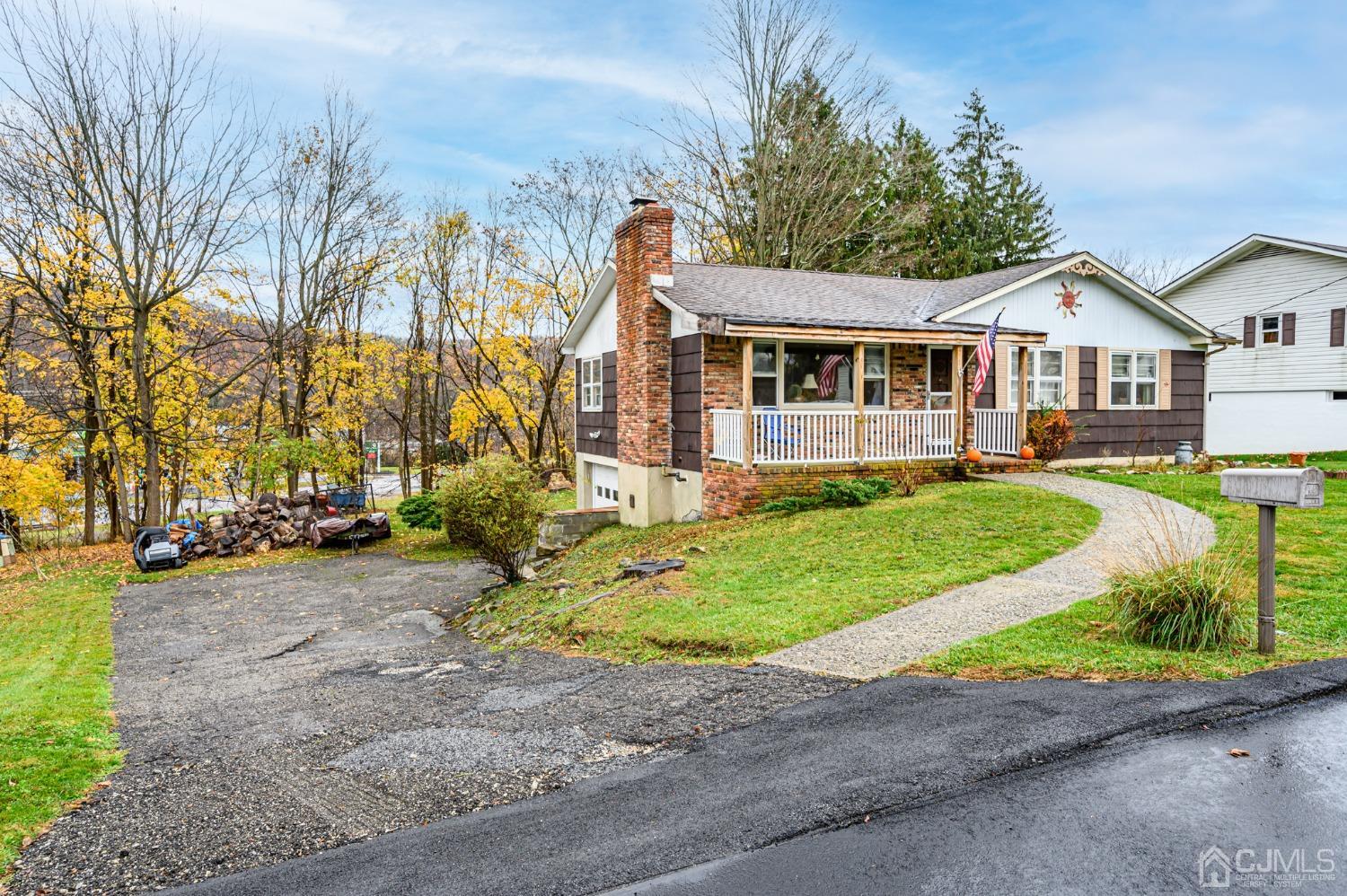 7 Lozaw Road Franklin, NJ 07416 - Photo 27 of 27 front view of a house with a small yard