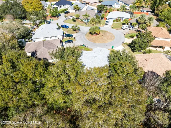 a view of a yard with swimming pool