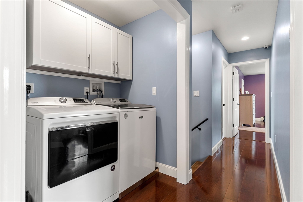 241 Plain Street Lowell, MA 01852 - Photo 14 of 33 a utility room with wooden floor washer and dryer