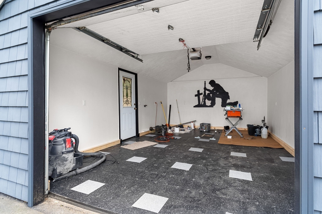 241 Plain Street Lowell, MA 01852 - Photo 30 of 33 a view of a room with gym equipment