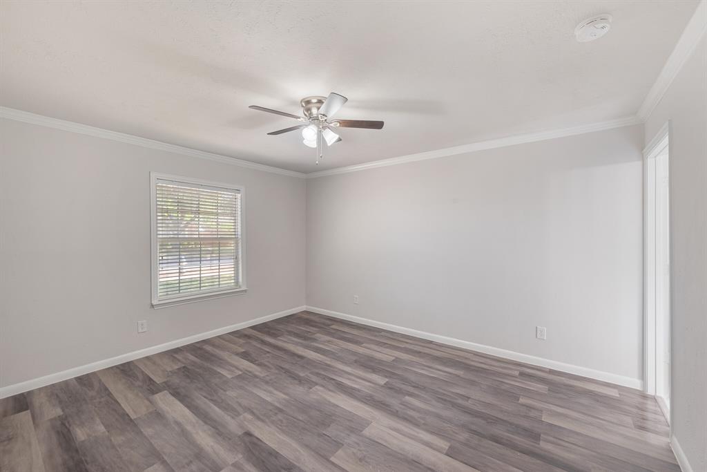 2038 Ash Hill Road Carrollton, TX 75007 - Photo 8 of 28 a view of an empty room with a window