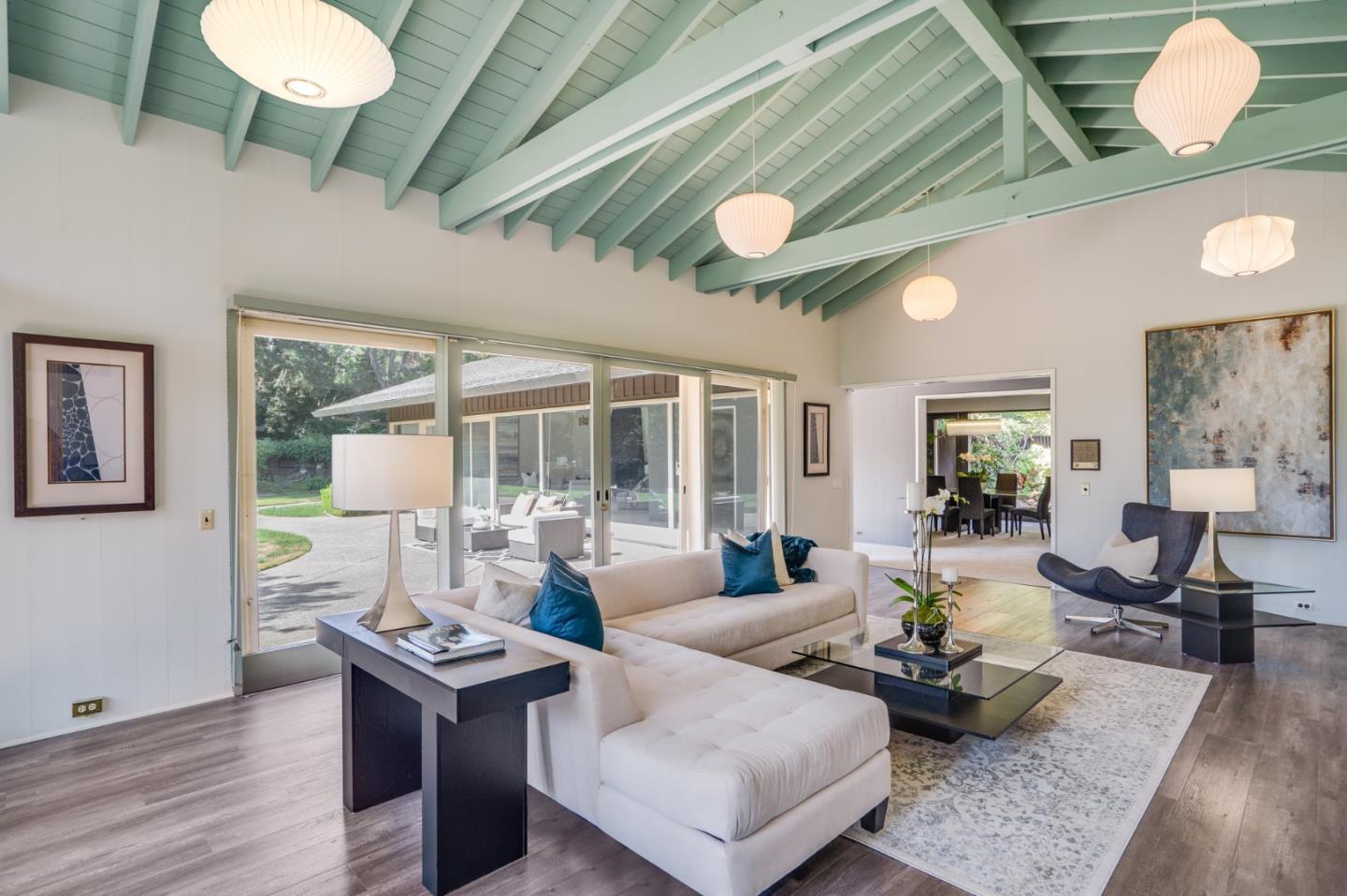 760 Chiltern Road Hillsborough, CA 94010 - Photo 14 of 56 a living room with furniture and a large window