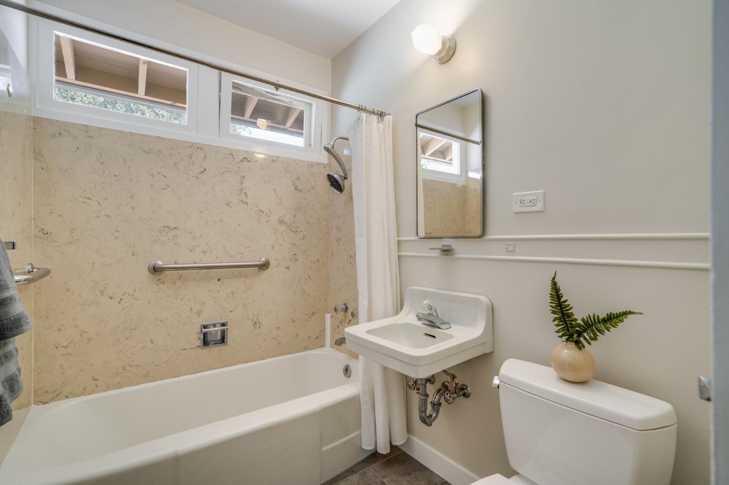 760 Chiltern Road Hillsborough, CA 94010 - Photo 21 of 56 a bathroom with a sink toilet and bathtub