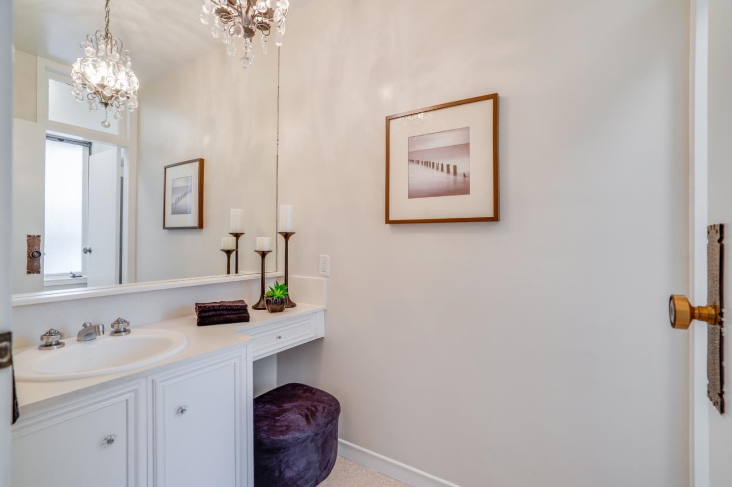 760 Chiltern Road Hillsborough, CA 94010 - Photo 23 of 56 a bathroom with a sink and a mirror