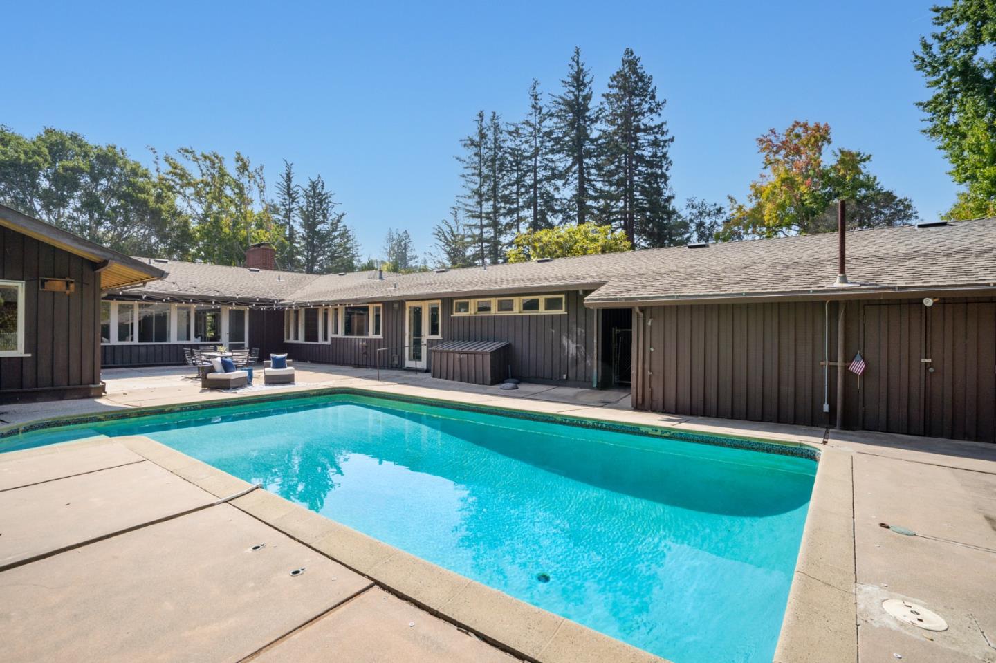 760 Chiltern Road Hillsborough, CA 94010 - Photo 42 of 56 a front view of a house with garden