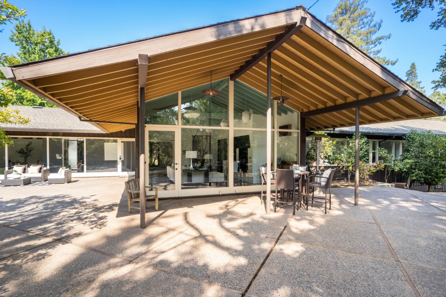 760 Chiltern Road Hillsborough, CA 94010 - Photo 47 of 56 a view of a house with a patio